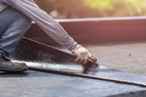 Professional Waterproofing technician working in West Falls, NY